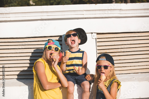 Kids eating ice cream outdoors