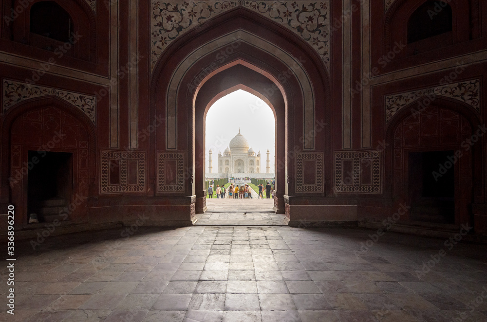 Perspective of the Taj Mahal main mausoleum and gardens from the gate, in Agra, India