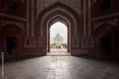 Perspective of the Taj Mahal main mausoleum and gardens from the gate, in Agra, India
