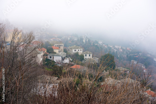 Fog above Milies village on mountain Pelion .Magnesia, Pelion.Greece photo