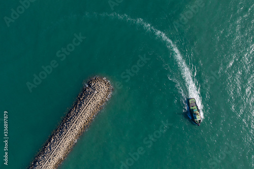 Top view of wavebreaker in the sea photo