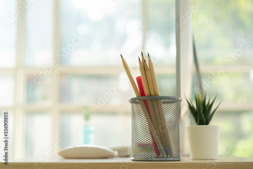 close up on group of pencil on desktop in home office for work fro home and social distance concept