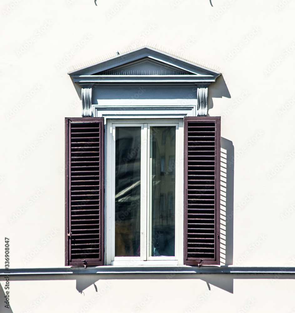 Naklejka premium ancient window of historic building