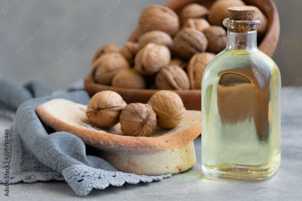 Biological walnut oil, healthy eating ingredient, vegan and vegetarian food. Biological walnut oil, healthy eating ingredient, vegan and vegetarian food.