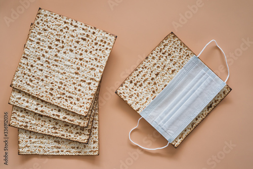 Matzah for Pesach in medical mask. Top view.