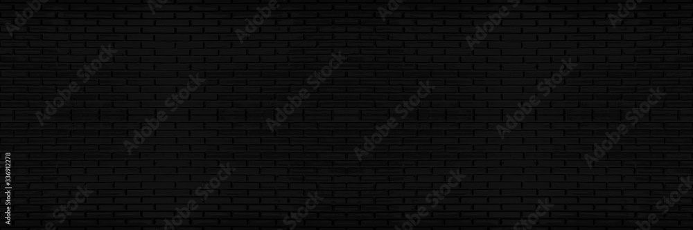 Black brick wall texture, brickwork for background design. wide panorama picture.