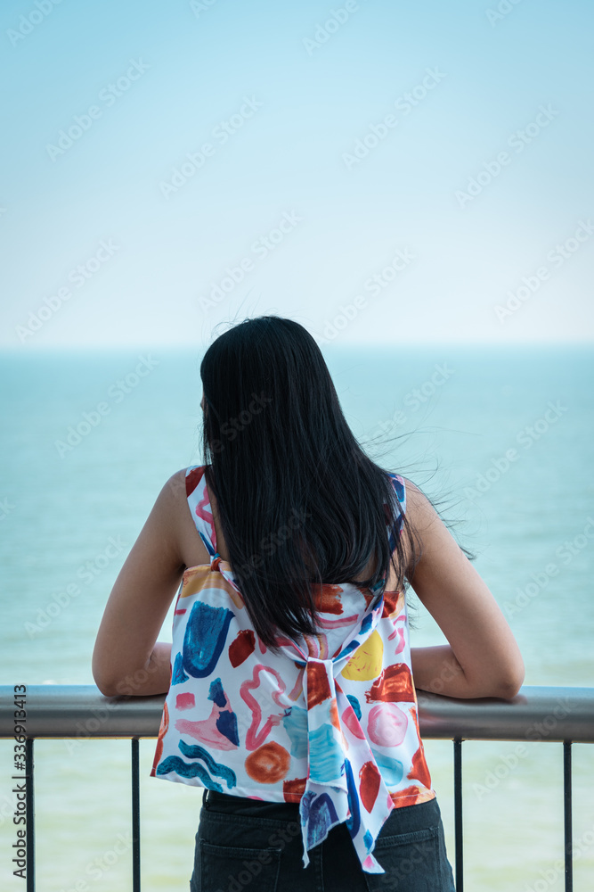 Woman relax at sea viewpoint in concept travel Woman relax at sea viewpoint in concept travel