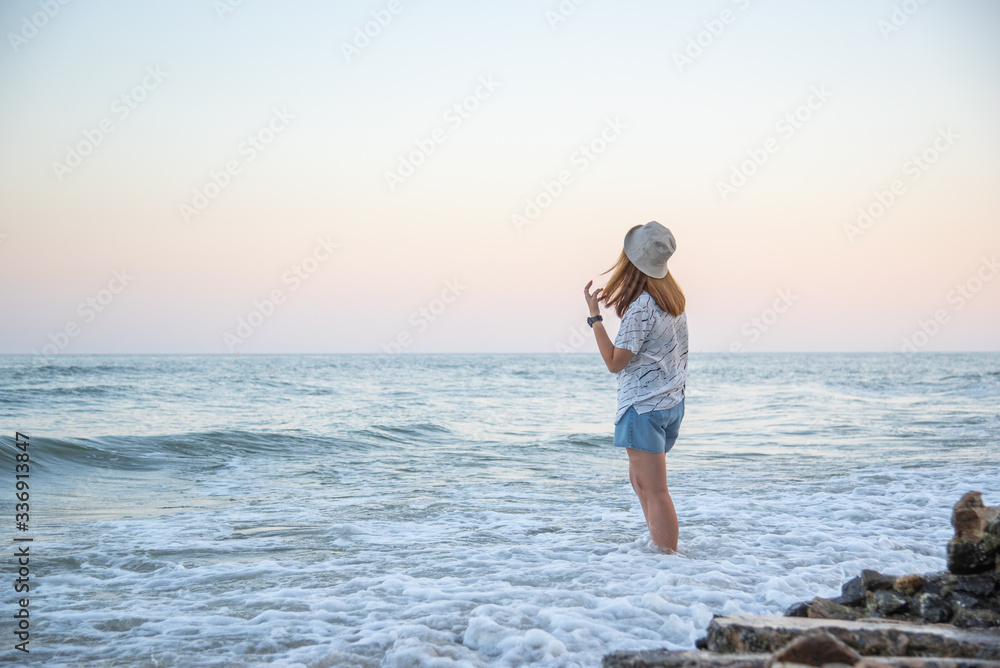 Woman relax at sea beach in concept travel