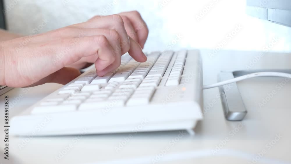 Man hands typing on computer keyboard, business man working on pc in office. Close-up - 4k footage. Man hands typing on computer keyboard, business man working on pc in office. Close-up - 4k footage.