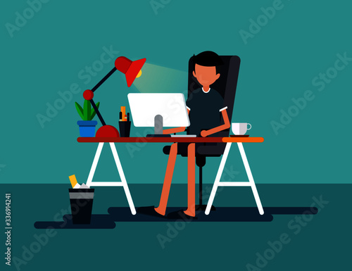 Man sitting at a desk and work on the computer, work at home