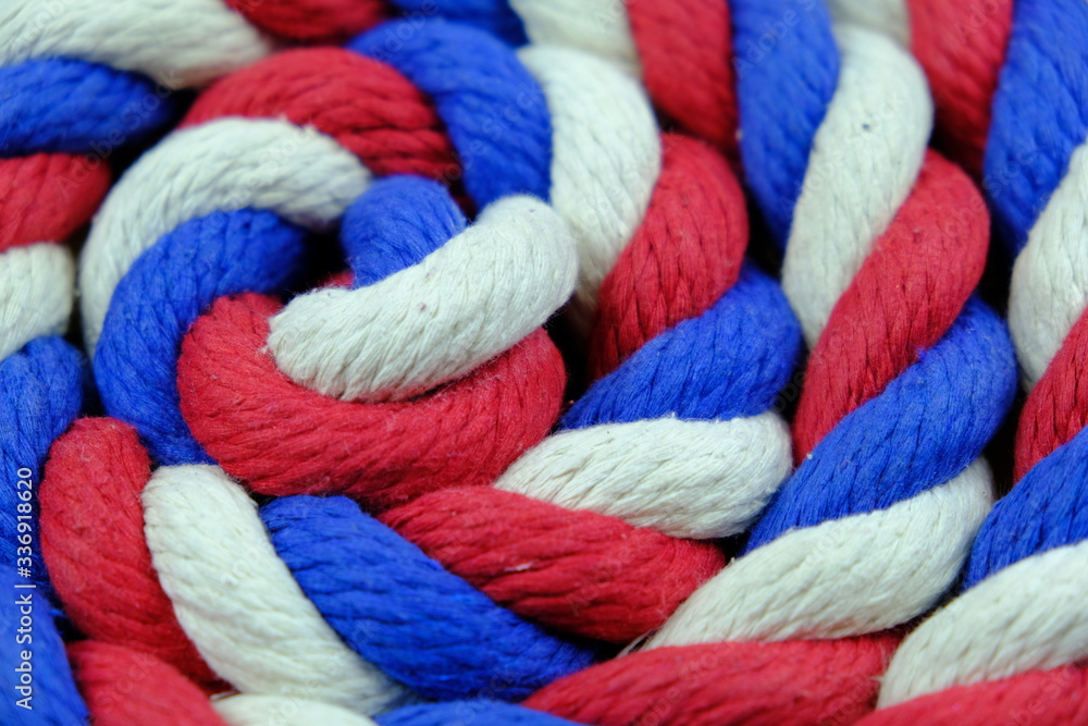 Colored bright rope twisted in a spiral for background