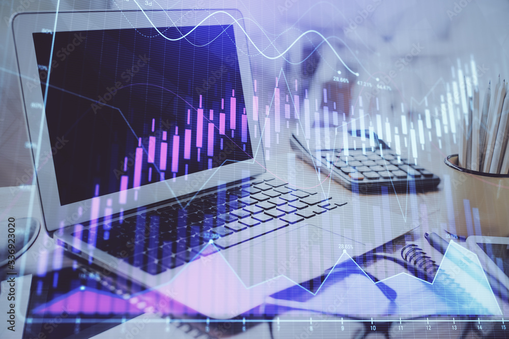 Stock market graph on background with desk and personal computer. Double exposure. Concept of financial analysis. Stock market graph on background with desk and personal computer. Double exposure. Concept of financial analysis.