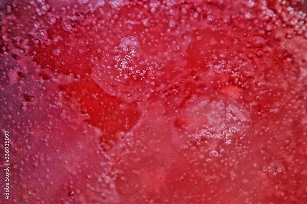 Red boiling jelly bubbles surface, texture for background Red boiling jelly bubbles surface, texture for background