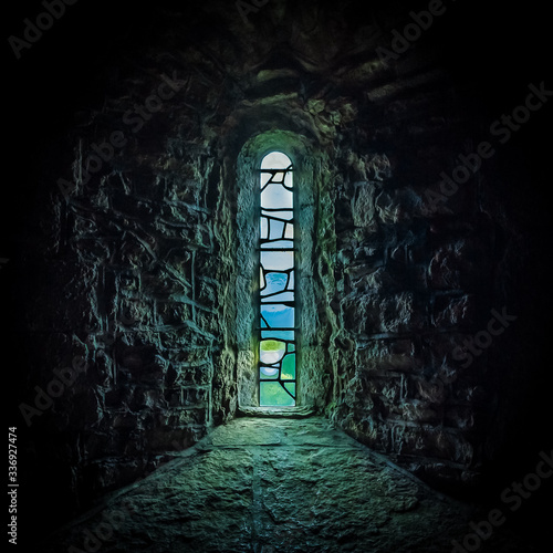 Obraz na płótnie Stained glass window behind the altar of Saint Aldhelm Chapel, St Albans Head near Worth Matravers, Dorset, UK w salonie