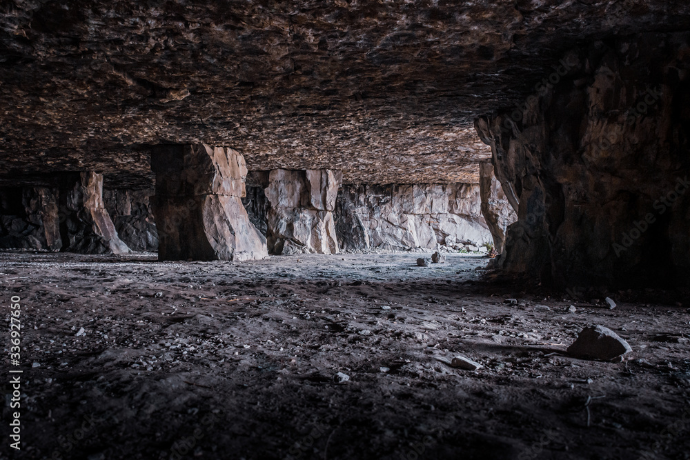 The supporting roof pillars inside the manmade Winspit Quarry Caves, Isle of Purbeck, Dorset, UK