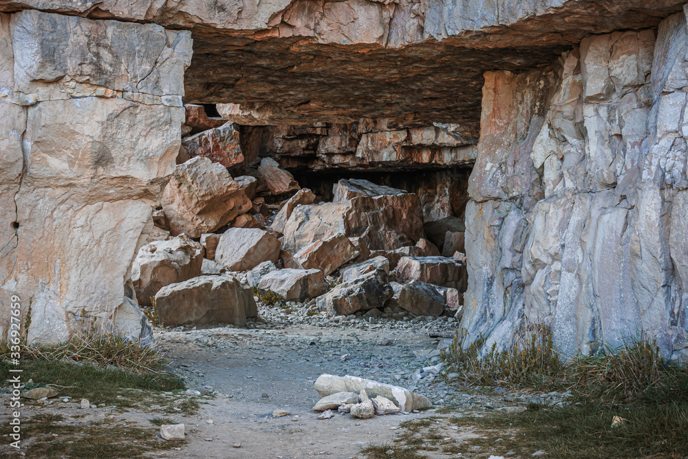 Fallen rocks through an opening at Winspit Quarry, Worth Matravers, Dorset, UK