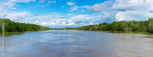 Fotografi Cruising on the river the Amazon, in the rain forest, Brazil