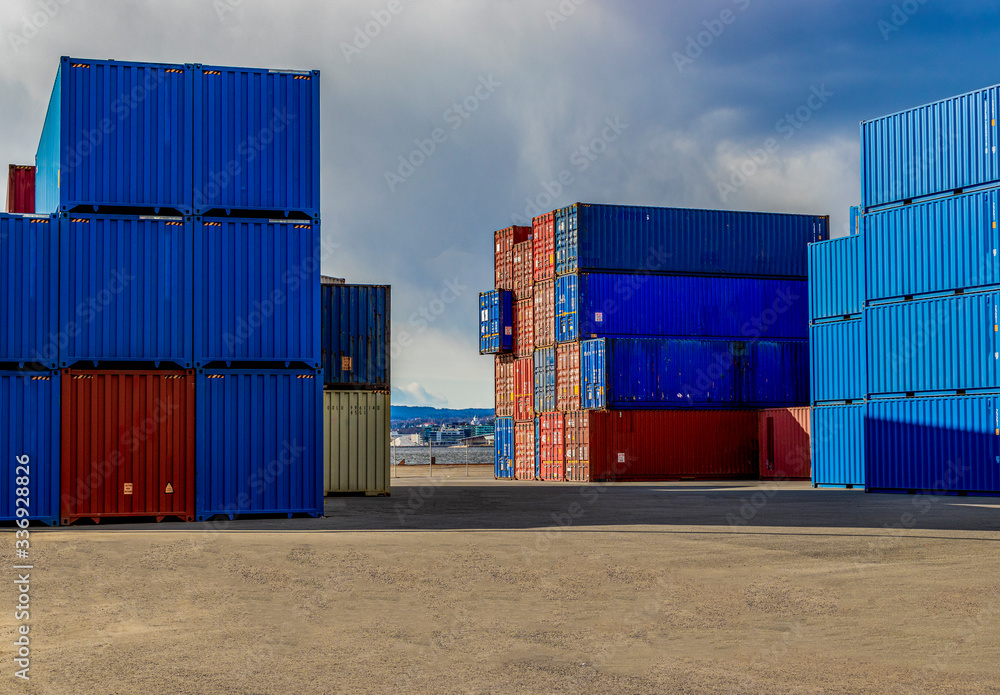Fototapeta premium Harbor yard with some stacked containers 