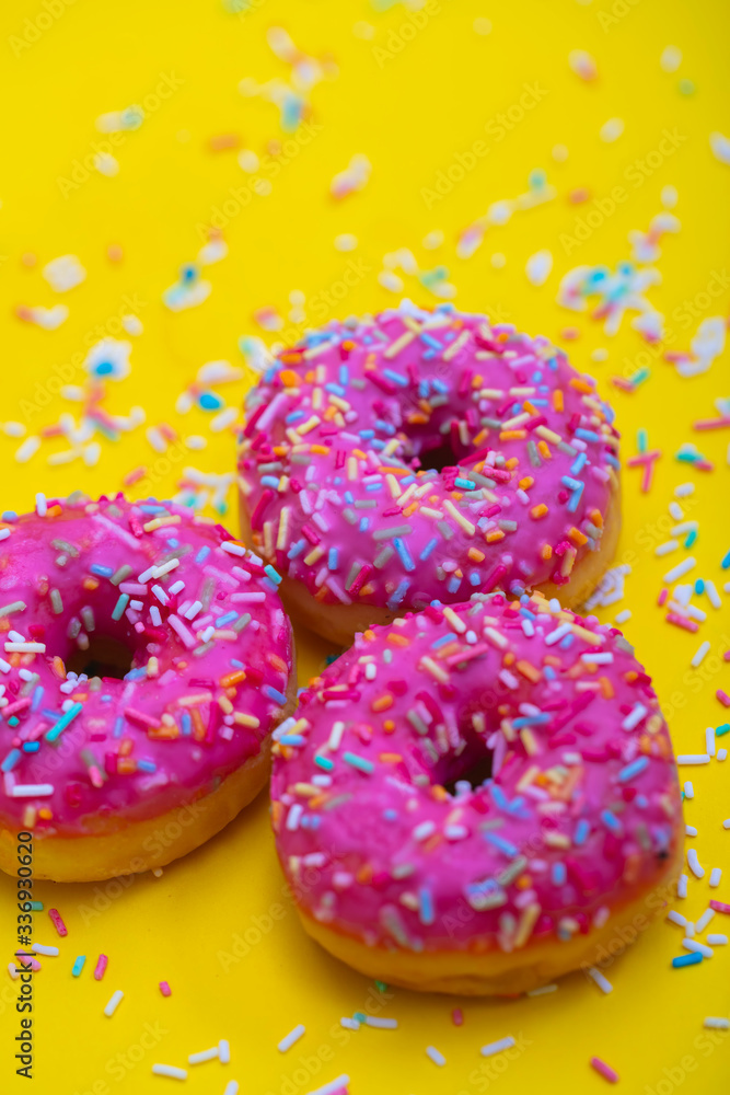 pink donuts with sugar sprinkles 