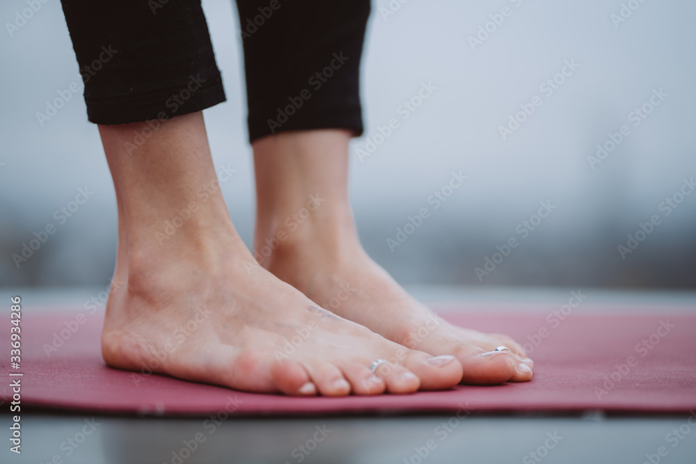 Close up detail of womans feet during yoga exercise. Close up detail of womans feet during yoga exercise.