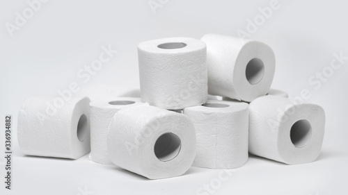 Rolls of toilet paper on a white background. Outbreak of the coronavirus concept COVID-19. Coronavirus - 2019-nKoV. Stay at home while in quarantine.