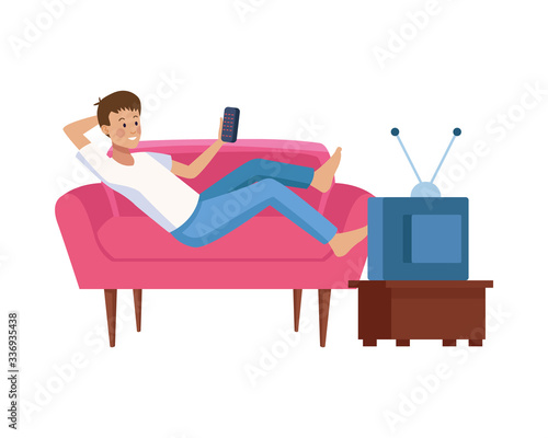 young man with control remote tv in sofa