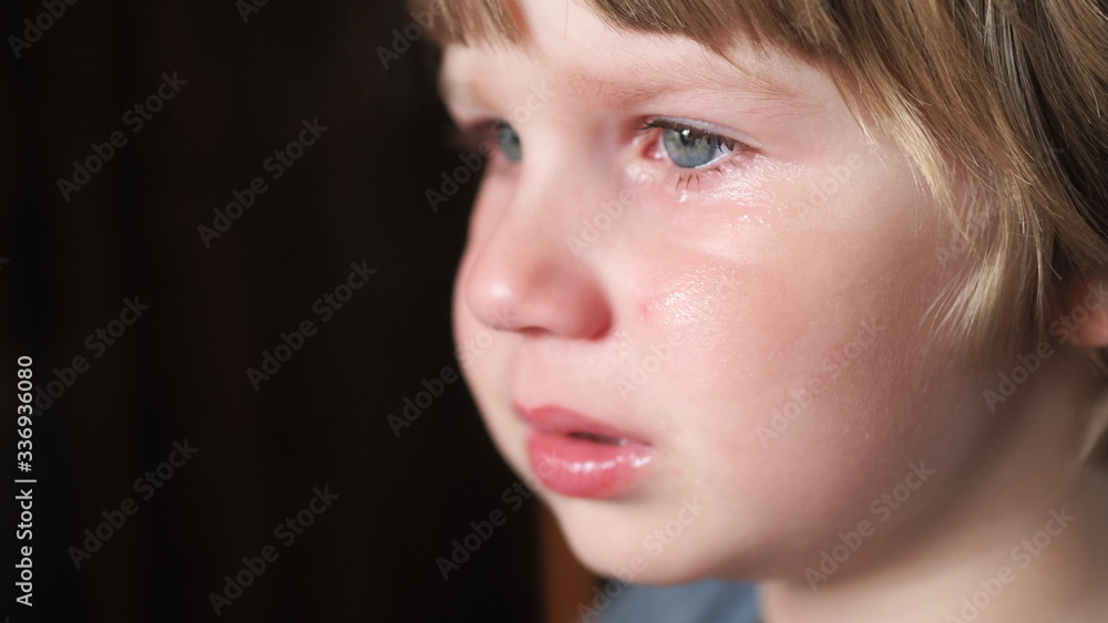 The little boy is crying and very upset. The boy is crying from resentment and grief, the tears of a child. The little boy is crying and very upset. The boy is crying from resentment and grief, the tears of a child.