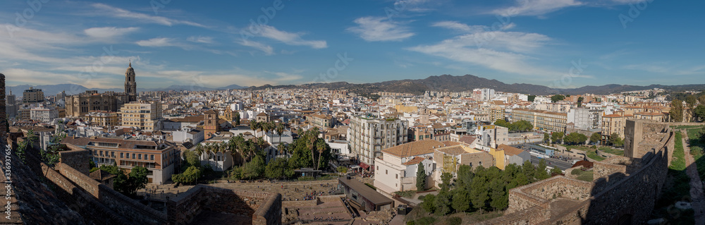 Horizontal wide panorama of the city of Malaga Spain.