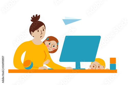 Tired mother works on computer. Children are naughty. Stay home. Quarantine social distancing period of pandemic corona virus or covid-19.