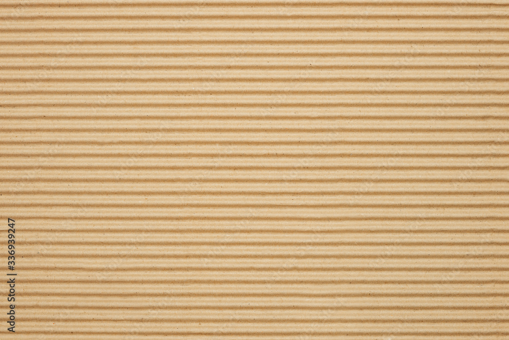 Brown kraft paper texture horizontal striped pattern for wrapping. Eco-friendly packaging concept. Brown kraft paper texture horizontal striped pattern for wrapping. Eco-friendly packaging concept.