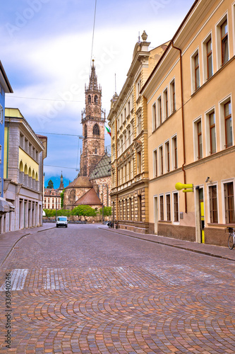 City of Bolzano empty old street and church view