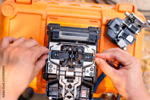 Fiber Optic Cable Connection Internet signal and Wire connection with Fiber Optic Fusion Splicing machine photo