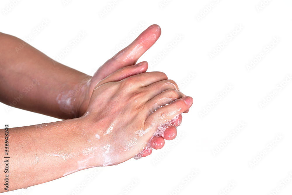 Young man wash hands with soap, closeup detail on soap bubbles, isolated on white. Can be used during coronavirus covid-19 outbreak prevention Young man wash hands with soap, closeup detail on soap bubbles, isolated on white. Can be used during coronavirus covid-19 outbreak prevention