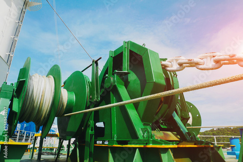 Tableau sur toile Low angle image Mooring winch, Mooring windlass rope anchor and anchor chain in drum at Deck ship forward in shipyard