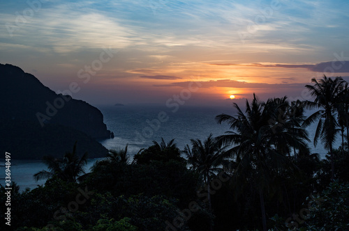 An amazing sunset from an elevated pointview on a hill in Koh Phi Phi Island  Krabi  Thailand