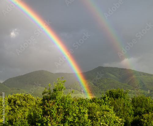 Fototapeta Naklejka Na Ścianę i Meble -  Double rainbow over country