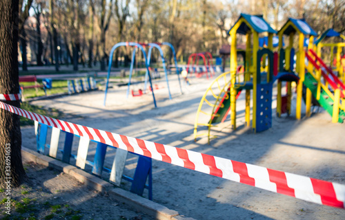   empty playgrounds, fenced, pandemic, quarantine, ban on walking for children, ban on walking on playgrounds   © ArtFilm