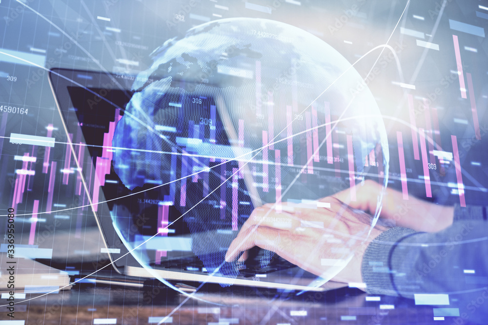 Double exposure of stock market graph with man working on laptop on background. Concept of financial analysis. Double exposure of stock market graph with man working on laptop on background. Concept of financial analysis.