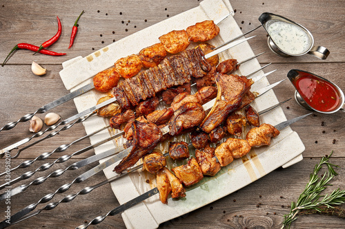 Barbecue. Grilled Pieces of Chicken, Beef, Pork on Charcoal.