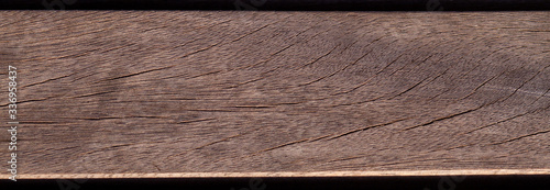 A single worn wooden board photo