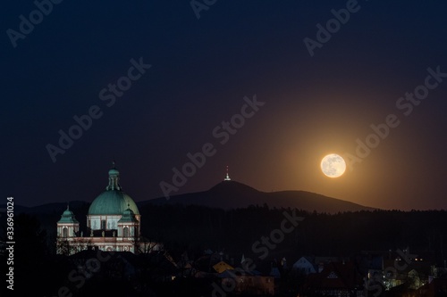 Obraz na płótnie Basilica in Jablonne v Podjestedi and Jested, in the background is super moon in night landscape w salonie