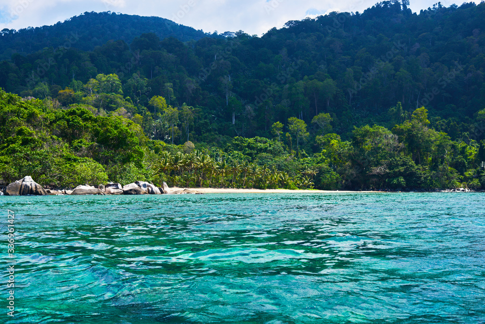 Beautiful nature landscape in Malaysia. Rain forest, mountains, ocean. View. Exploring tropical Tioman island. Travel concept and idea. Beautiful turquoise ocean.