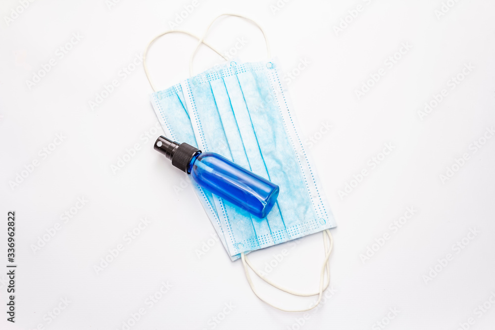 Mask and sanitizer isolated on white background Mask and sanitizer isolated on white background