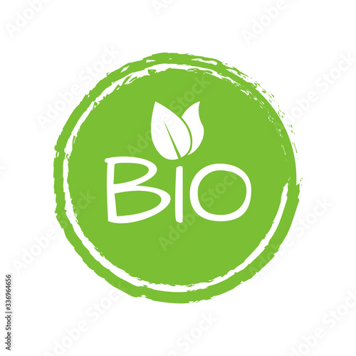 Bio logo or label with green leaves. Vector illustration.