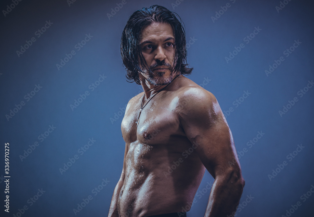 Obraz premium sexy muscular body model portrait of a young man