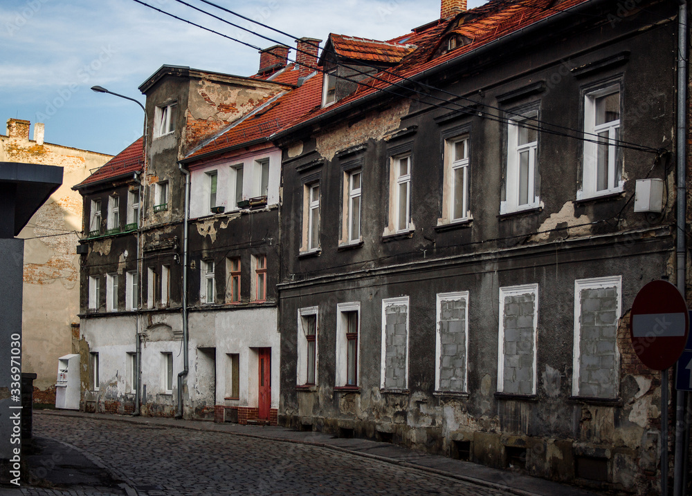 Old crumbling building in East Europe. People living in need