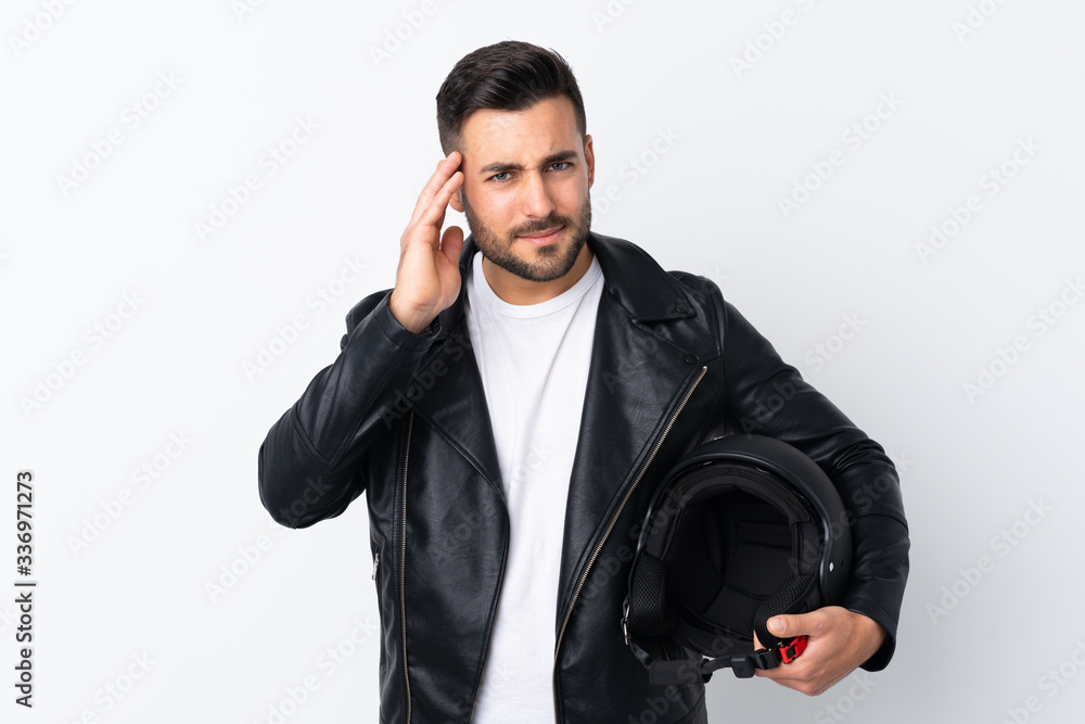 Man with a motorcycle helmet unhappy and frustrated with something. Negative facial expression Man with a motorcycle helmet unhappy and frustrated with something. Negative facial expression