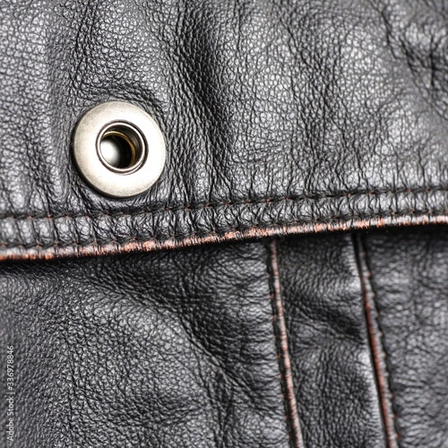A fragment of outerwear made of genuine leather.