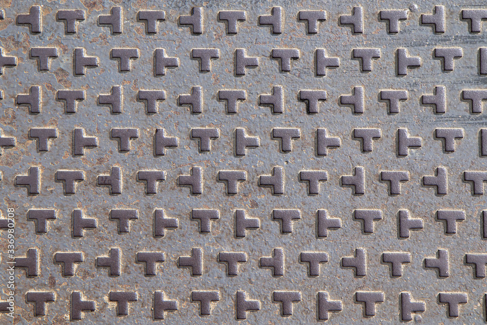 Metal texture background, metal plate with squares. Picture of metal background.