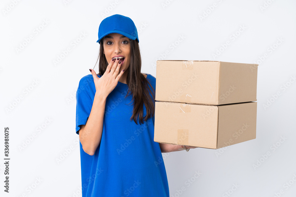 Young delivery woman over isolated white background with surprise facial expression Young delivery woman over isolated white background with surprise facial expression